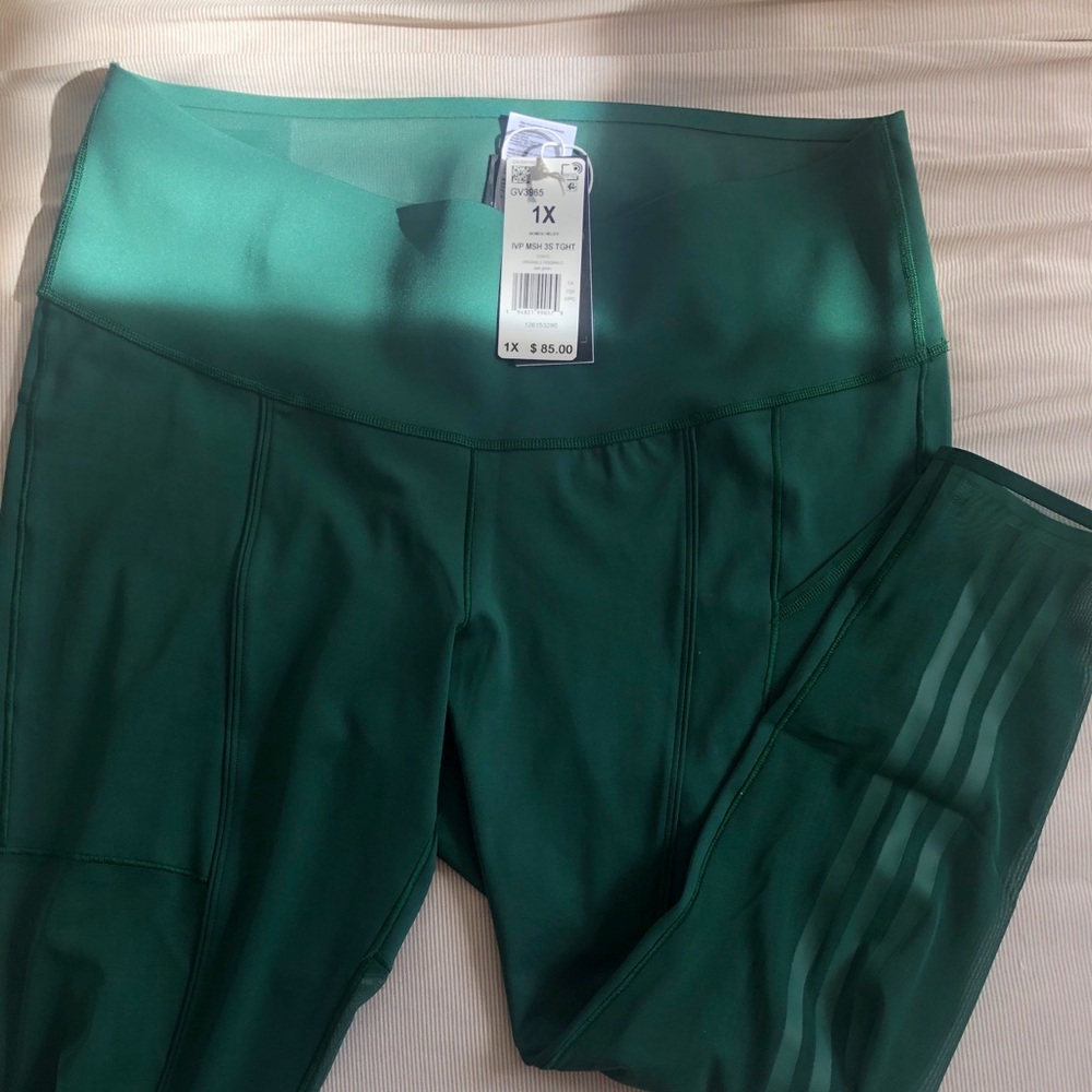 adidas x Ivy Park leggings in green, mesh inserts